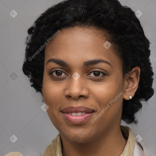 Joyful black young-adult female with long  black hair and brown eyes