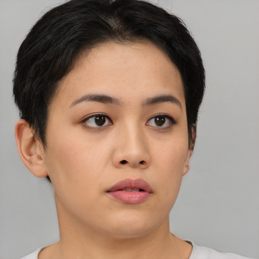 Neutral asian young-adult female with short  brown hair and brown eyes