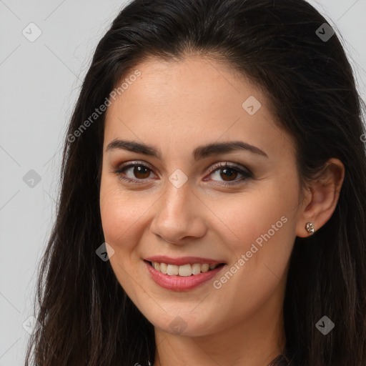 Joyful white young-adult female with long  brown hair and brown eyes