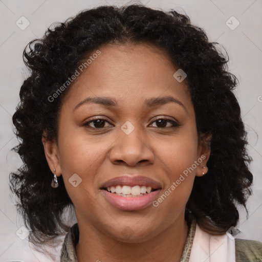 Joyful black young-adult female with medium  brown hair and brown eyes