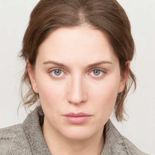 Neutral white young-adult female with medium  brown hair and blue eyes