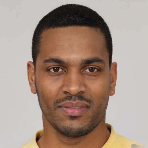 Neutral black young-adult male with short  black hair and brown eyes