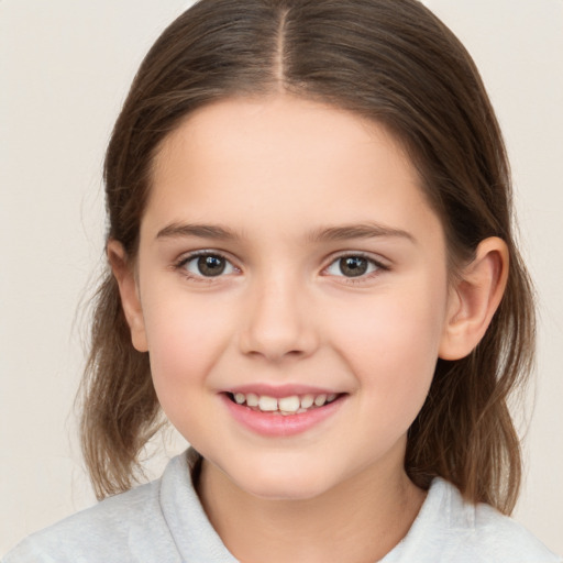 Joyful white child female with medium  brown hair and brown eyes