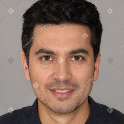 Joyful white young-adult male with short  black hair and brown eyes