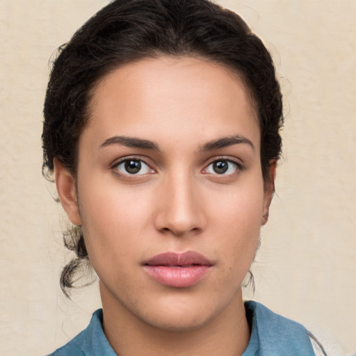 Neutral white young-adult female with medium  brown hair and brown eyes