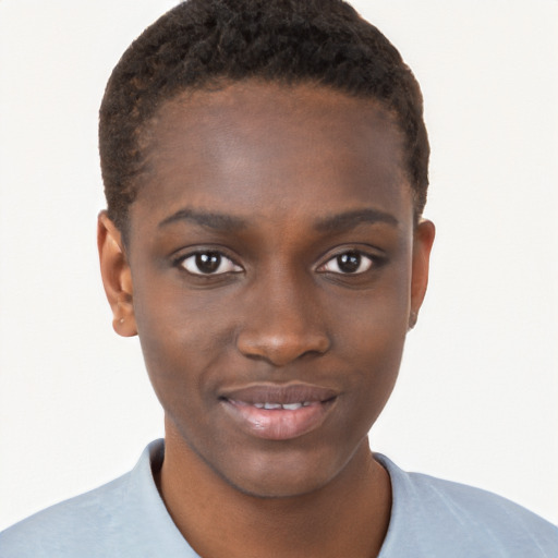 Joyful black young-adult male with short  brown hair and brown eyes