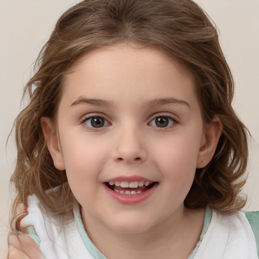 Joyful white child female with medium  brown hair and brown eyes