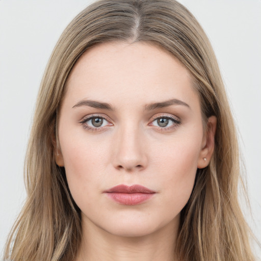 Neutral white young-adult female with long  brown hair and grey eyes