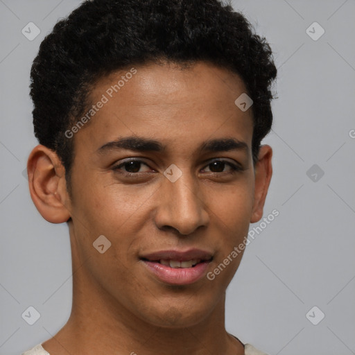 Joyful latino young-adult male with short  brown hair and brown eyes