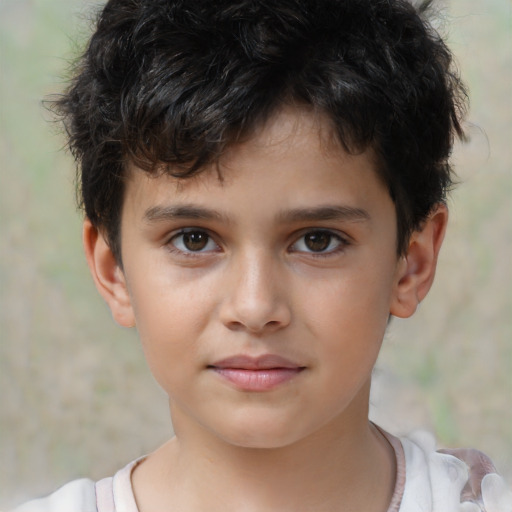 Joyful white child male with short  brown hair and brown eyes