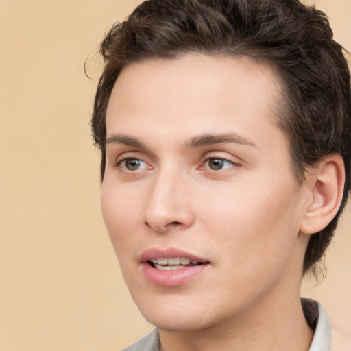 Joyful white young-adult male with medium  brown hair and brown eyes