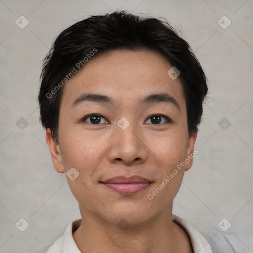 Joyful asian young-adult female with short  brown hair and brown eyes