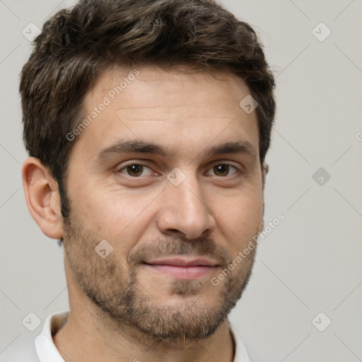 Joyful white adult male with short  brown hair and brown eyes