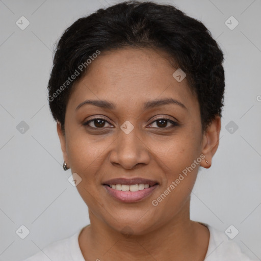 Joyful latino young-adult female with short  brown hair and brown eyes