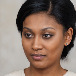 Joyful asian young-adult female with medium  black hair and brown eyes