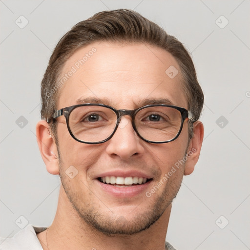 Joyful white adult male with short  brown hair and grey eyes