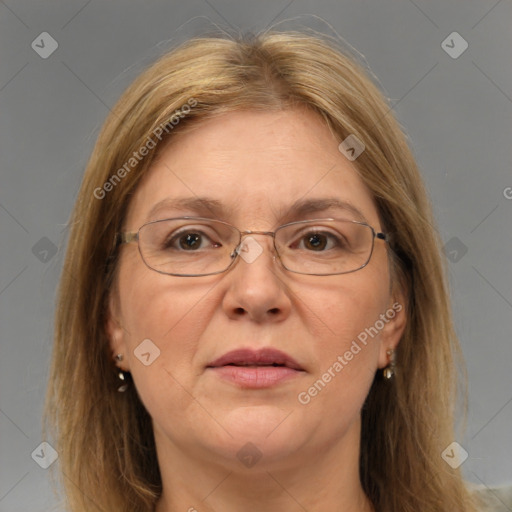 Joyful white adult female with medium  brown hair and brown eyes