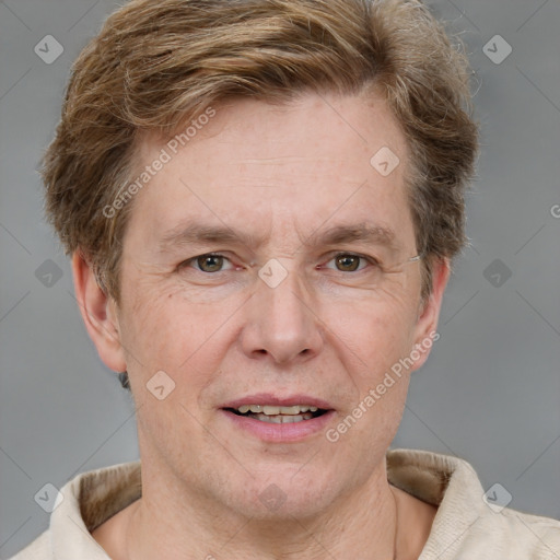 Joyful white adult male with short  brown hair and grey eyes