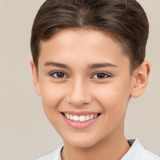 Joyful white child female with short  brown hair and brown eyes