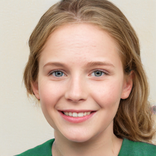 Joyful white young-adult female with medium  brown hair and green eyes