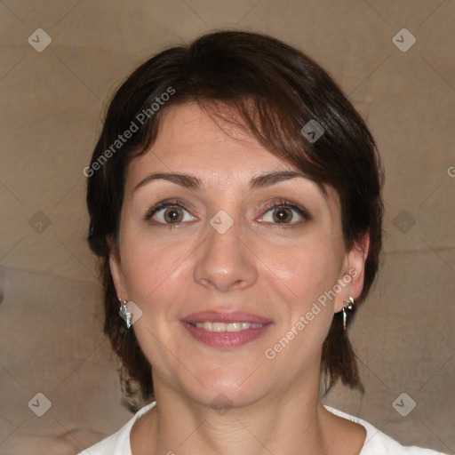 Joyful white adult female with medium  brown hair and brown eyes