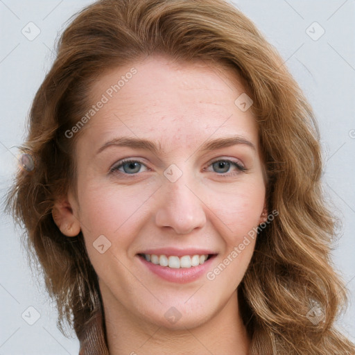 Joyful white young-adult female with long  brown hair and blue eyes