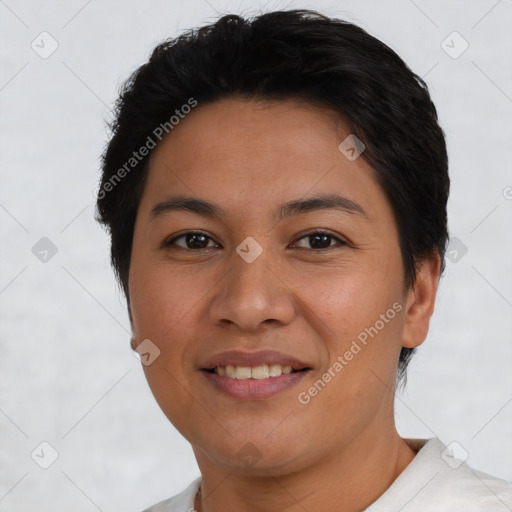 Joyful latino young-adult female with short  brown hair and brown eyes