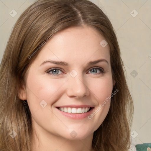 Joyful white young-adult female with medium  brown hair and green eyes