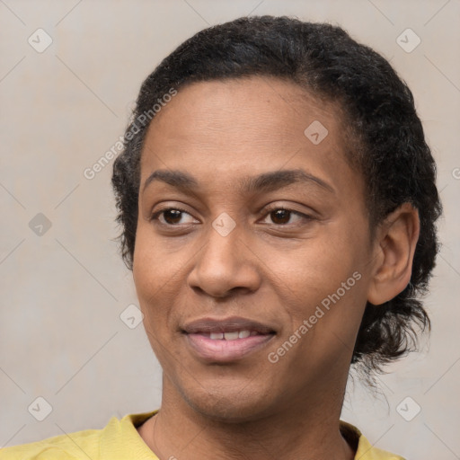 Joyful latino young-adult female with short  black hair and brown eyes