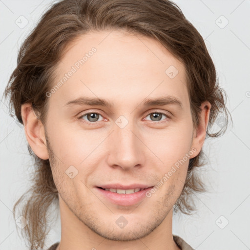 Joyful white young-adult male with medium  brown hair and brown eyes