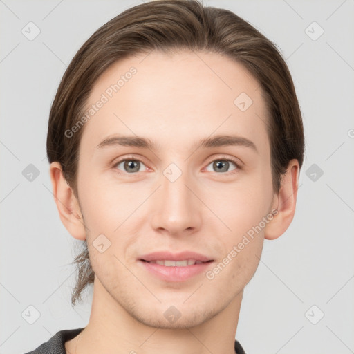 Joyful white young-adult female with short  brown hair and grey eyes