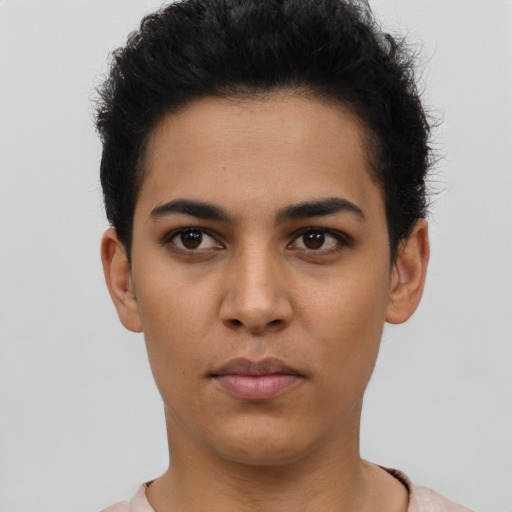 Neutral latino young-adult female with short  black hair and brown eyes