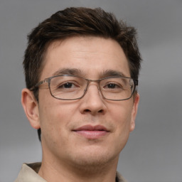 Neutral white adult male with short  brown hair and brown eyes