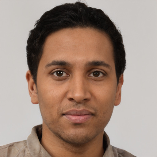 Neutral latino young-adult male with short  brown hair and brown eyes