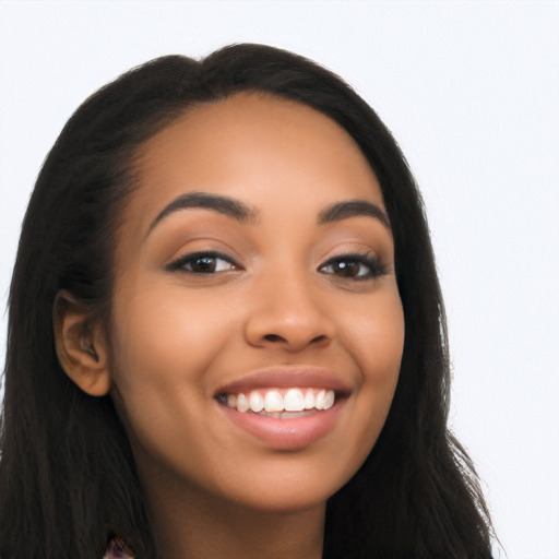 Joyful latino young-adult female with long  black hair and brown eyes