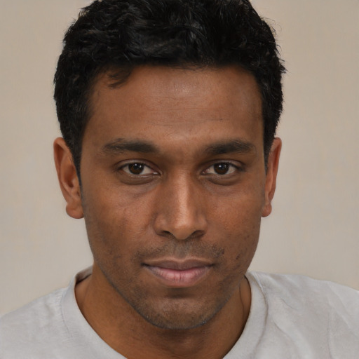 Neutral black young-adult male with short  black hair and brown eyes