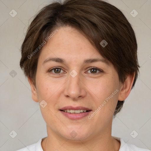 Joyful white adult female with medium  brown hair and brown eyes