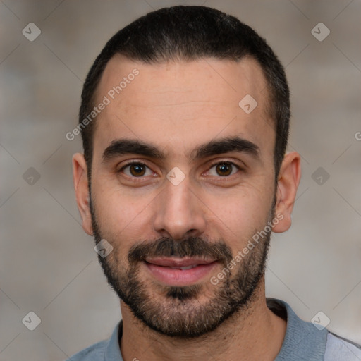 Joyful white young-adult male with short  black hair and brown eyes