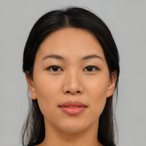 Joyful asian young-adult female with medium  black hair and brown eyes