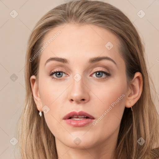 Neutral white young-adult female with long  brown hair and grey eyes