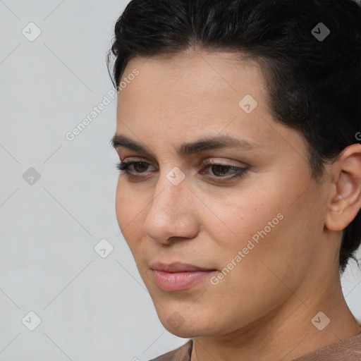 Joyful white young-adult female with short  brown hair and brown eyes