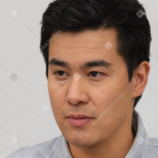 Neutral asian young-adult male with short  black hair and brown eyes