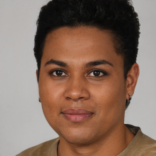 Joyful black young-adult female with short  brown hair and brown eyes