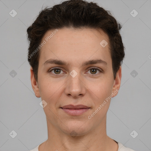 Joyful white young-adult female with short  brown hair and grey eyes