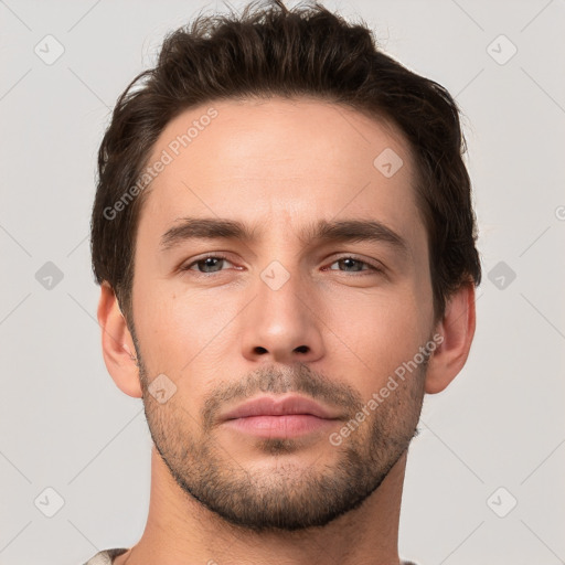 Neutral white young-adult male with short  brown hair and brown eyes