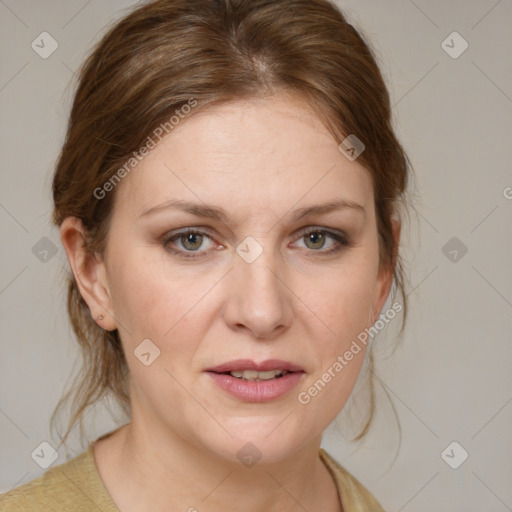 Joyful white young-adult female with medium  brown hair and blue eyes