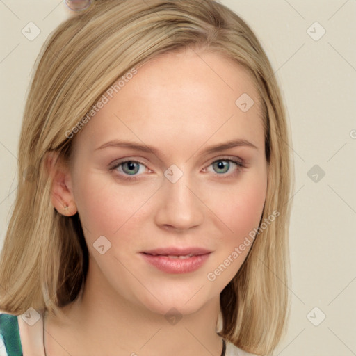 Joyful white young-adult female with long  brown hair and blue eyes