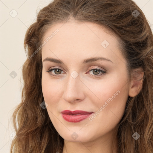 Joyful white young-adult female with long  brown hair and green eyes