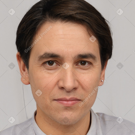 Joyful white adult male with short  brown hair and brown eyes