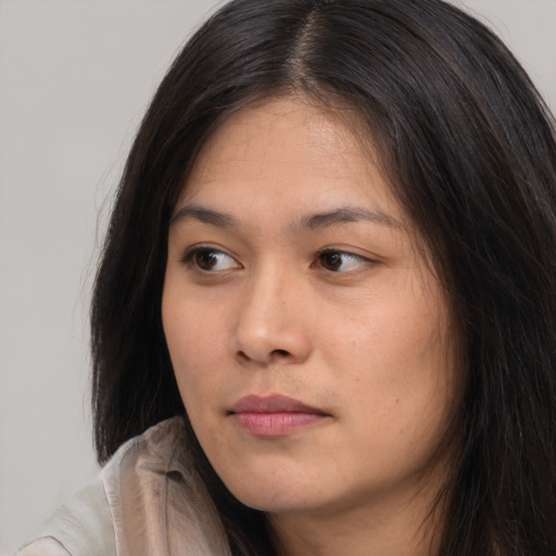 Neutral asian young-adult female with long  brown hair and brown eyes